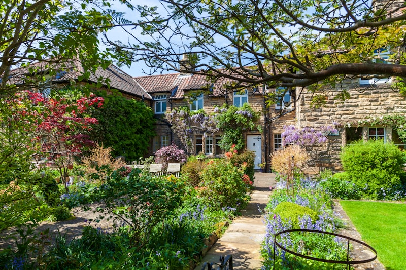 House with garden and spring flowers showing great curb appeal